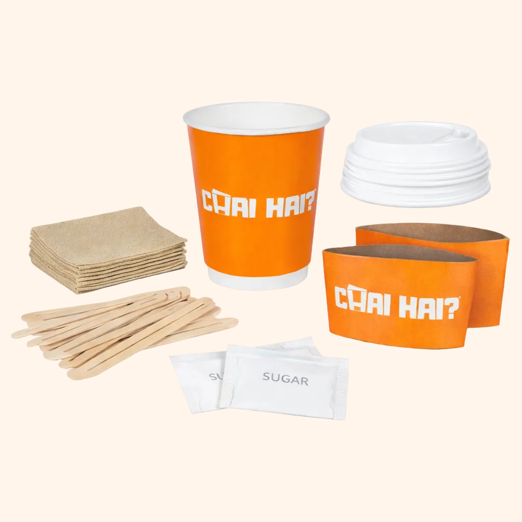 Disposable Chai Cups – Eco-friendly ripple paper cup with a secure lid, stirrers, and a single-serve chai powder sachet for a convenient chai experience from Chai Hai